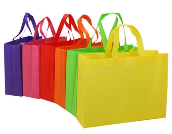 Party Favor Bags with Die Cut Handles - 60-Pack Reusable Non-Woven Gift Bags, Rainbow Color Retail Bags for Goodies, Treats, Great for Kids Birthday Party