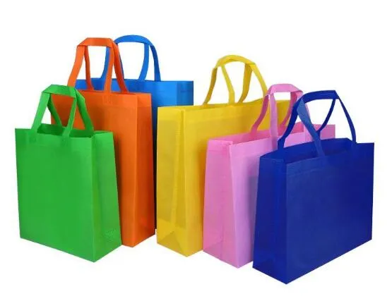Party Favor Bags with Die Cut Handles - 60-Pack Reusable Non-Woven Gift Bags, Rainbow Color Retail Bags for Goodies, Treats, Great for Kids Birthday Party